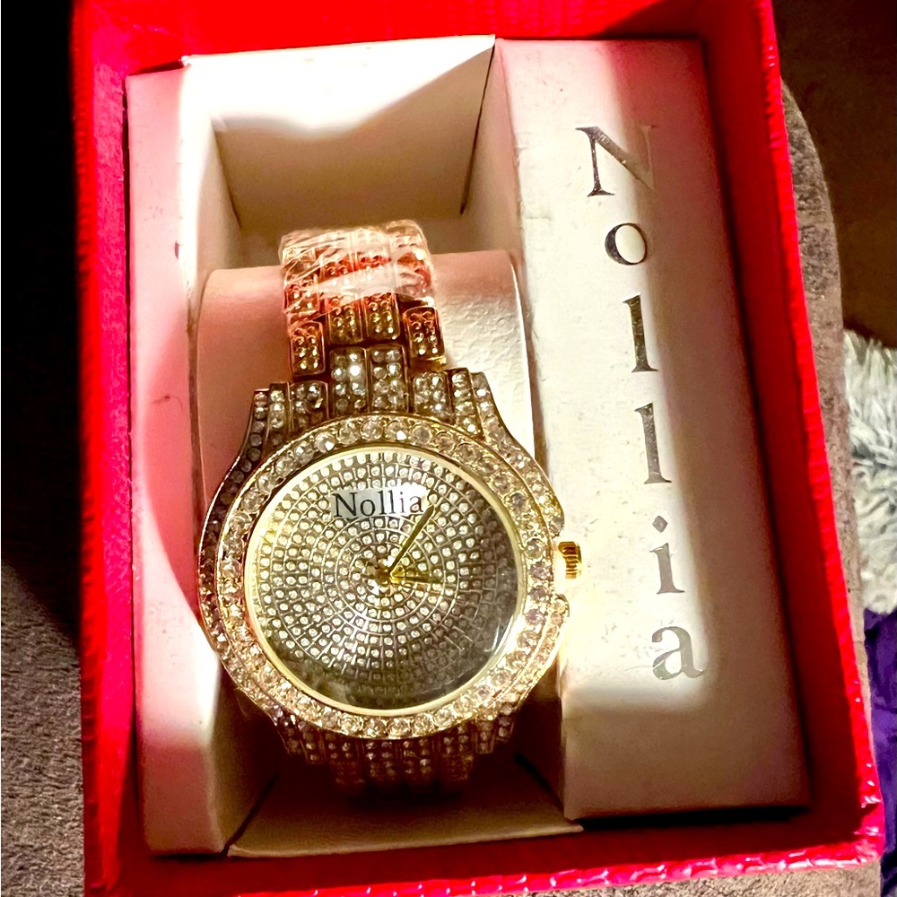 Goldtone watch.